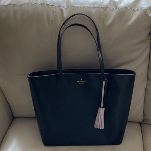 kate spade Handbags - kate spade black leather tote with pink tassel charm